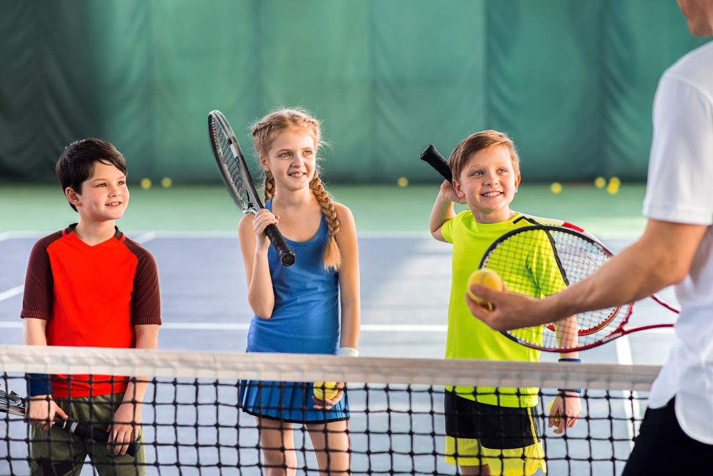 Girl and 2 Boys with Raquets